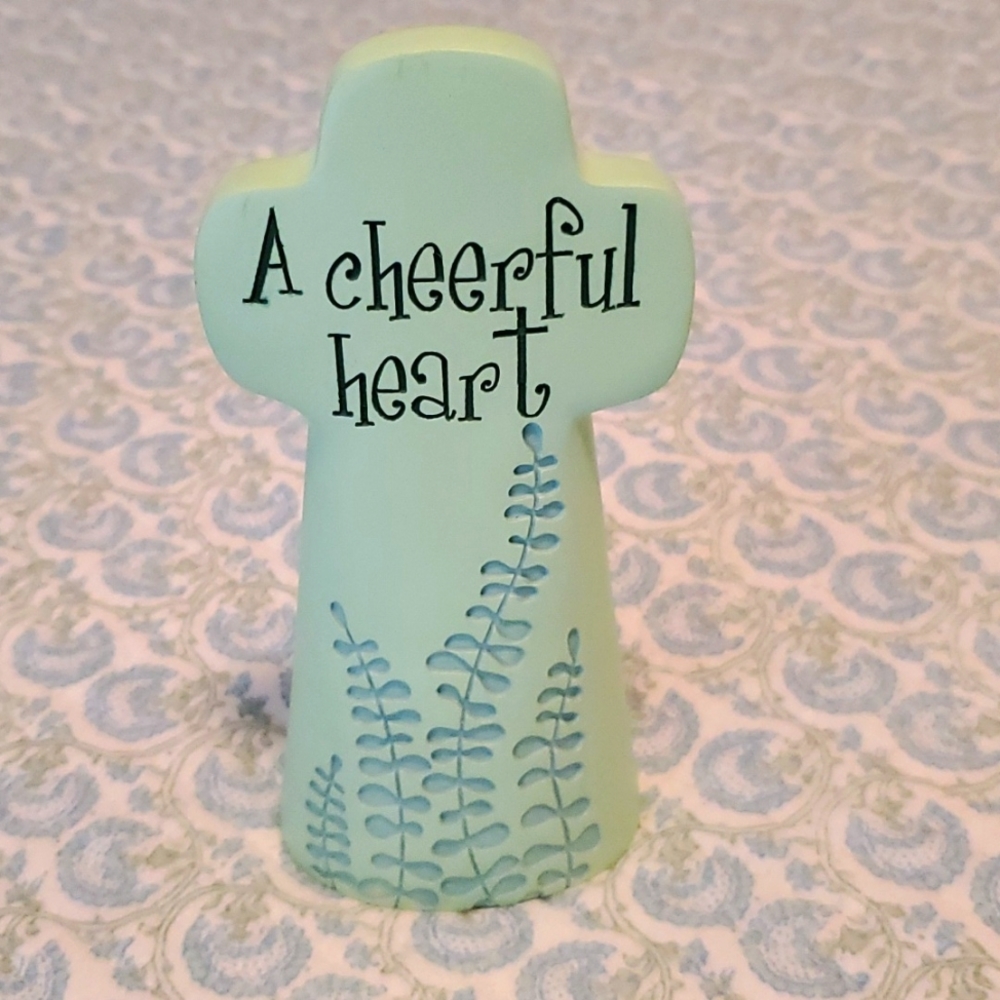 Cross Figurine with message A Cheerful Heart and Proverb 17:22